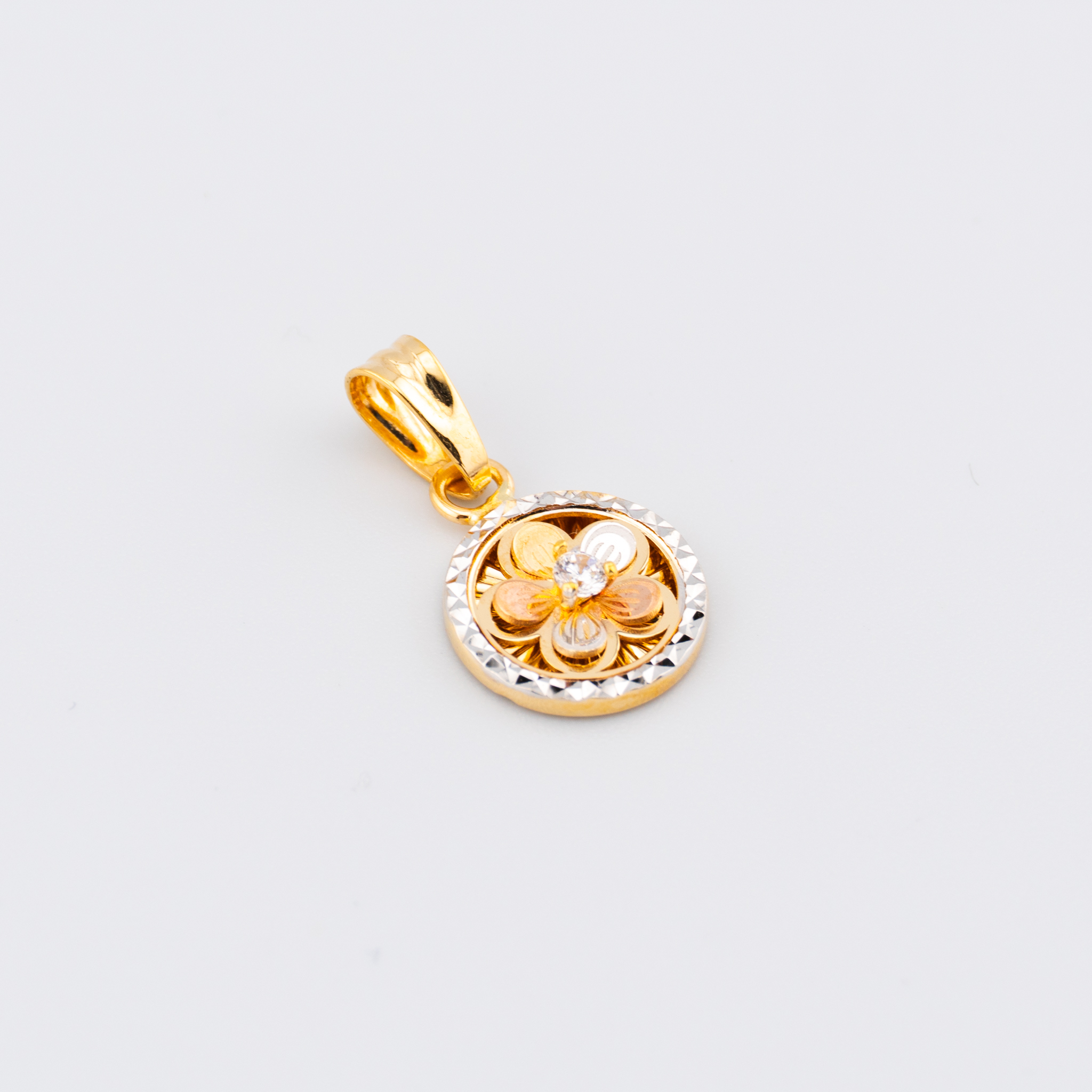 Dije de flor con cristal