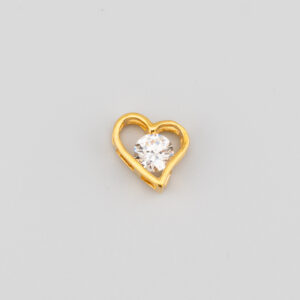 Dije de corazón con cristal central