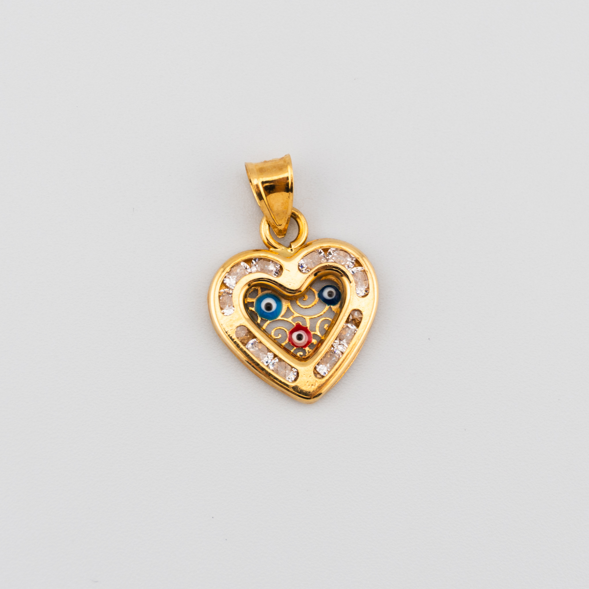 Dije de Corazón y ojos turcos con cristales